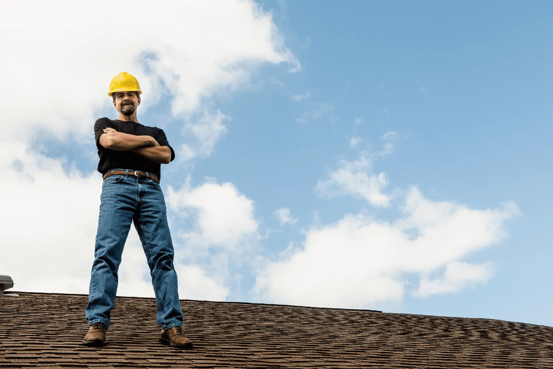 worker safe on roof with general liability insurance